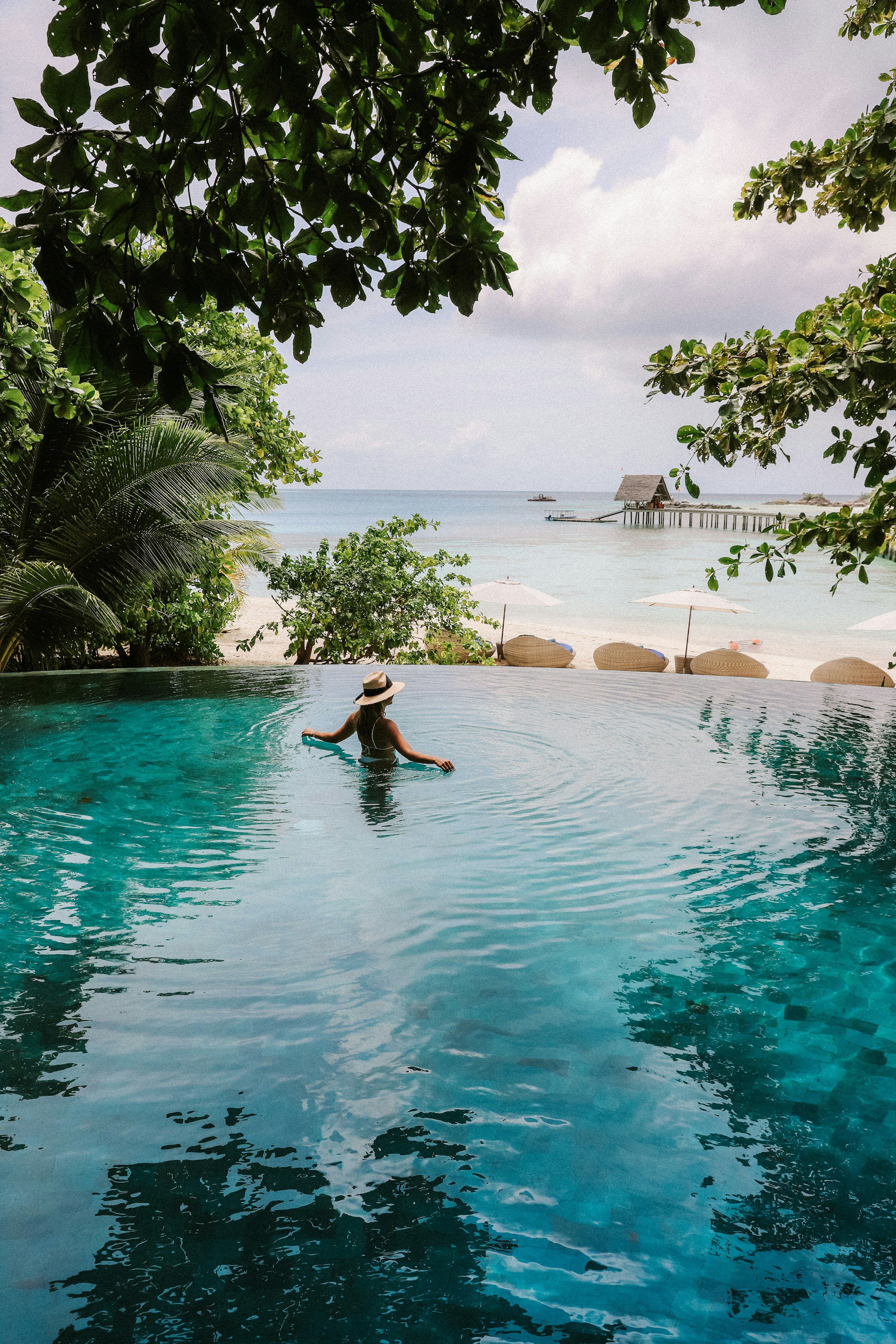 Pool overlooking the sea at a tropical resort